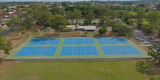 MacGregor - Byron Blue courts with Grass Green surround